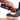 A hand applies cleaning foam to a shoe using a spray bottle labeled Forge Field.